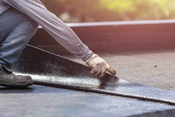 Professional Waterproofing technician working in Orchard Park, NY